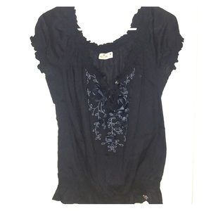 Navy blouse with floral design